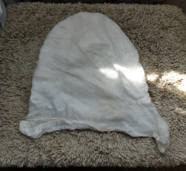 Silk caps are like silk hankies except they are shaped differently. 